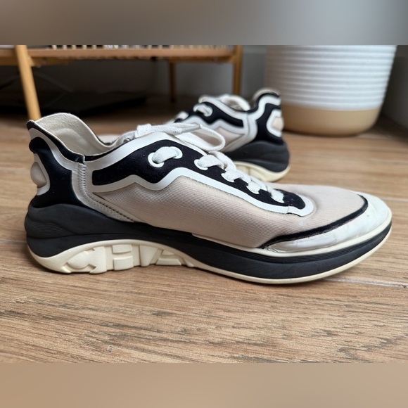 Authentic CHANEL White and Black Active Sneakers - Picture 4 of 12